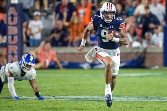 Auburn Tigers quarterback Robby Ashford (9) runs for big yardage and a first down during the San Jose State vs Auburn game on Saturday, Sept. 10, 2022.